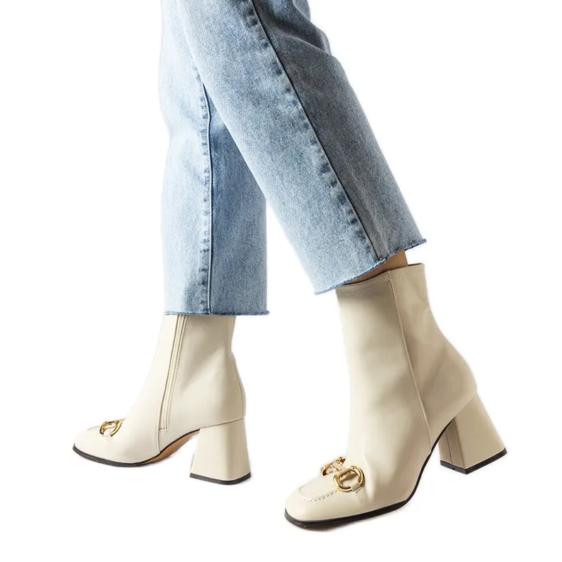 Beige block heel boots from Castione